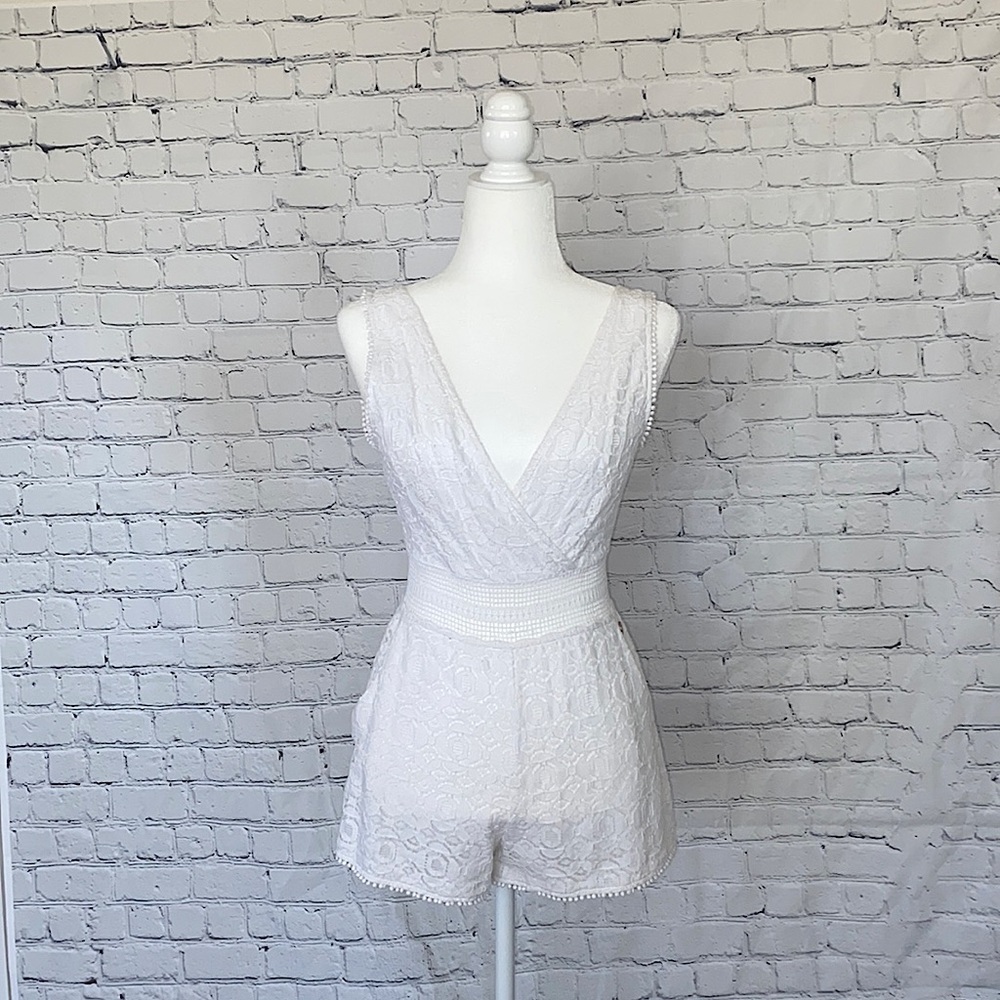 Kendall and Kylie White crochet Romper. Used.